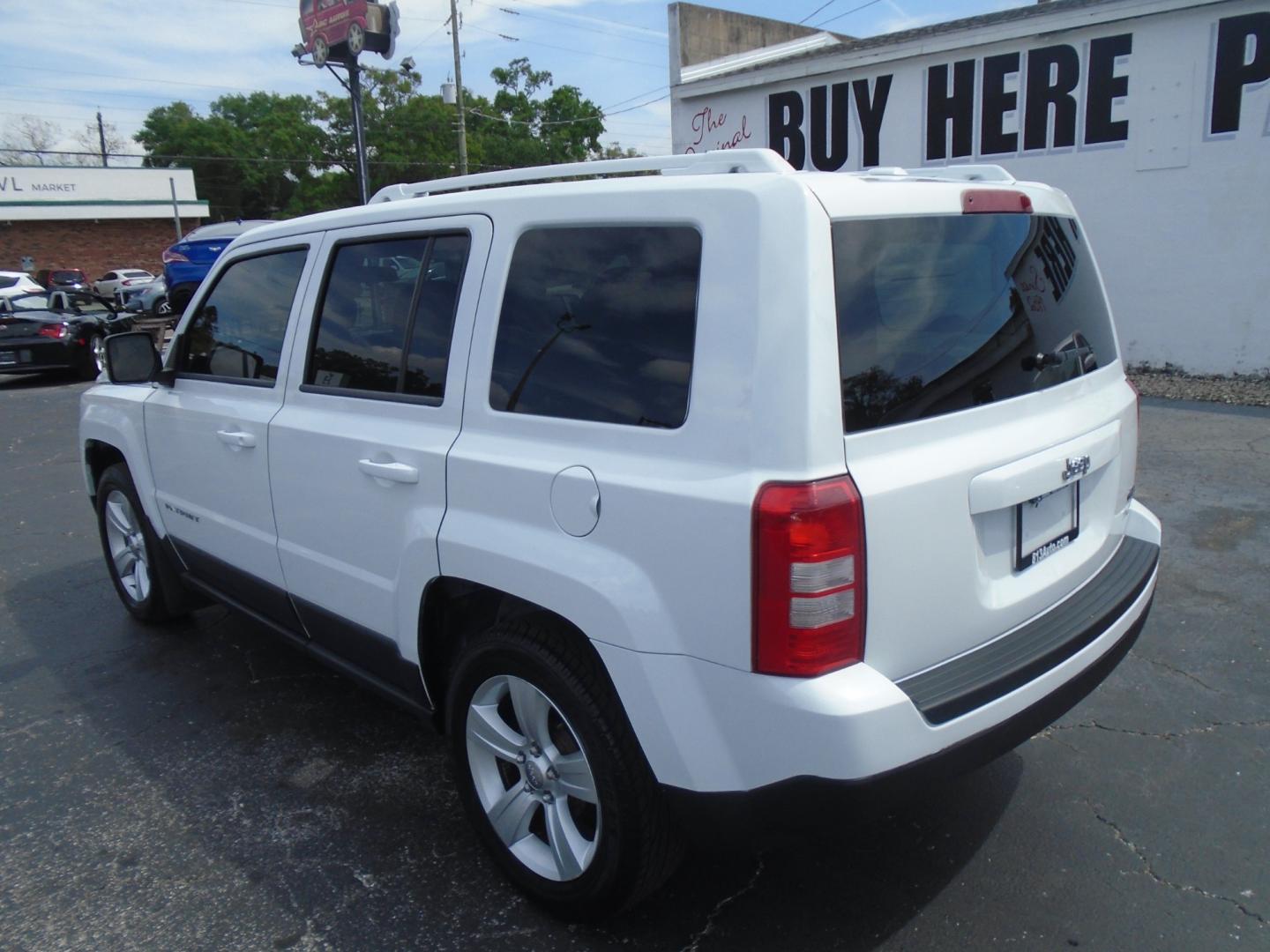 2014 Jeep Patriot Latitude 2WD (1C4NJPFA5ED) with an 2.0L L4 DOHC 16V engine, located at 6112 N Florida Avenue, Tampa, FL, 33604, (888) 521-5131, 27.954929, -82.459534 - Photo#4